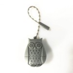 Tea filter, infuser, owl form, grey color